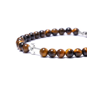 Genesis Cross centerpiece on men’s Tiger Eye bracelet, symbol of faith and strength