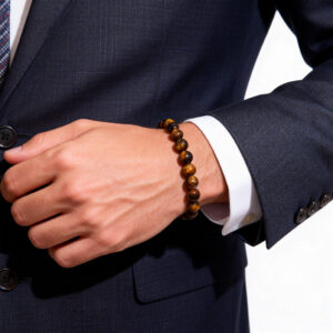 Lifestyle image of a men’s yellow tiger eye bracelet symbolizing confidence and balance