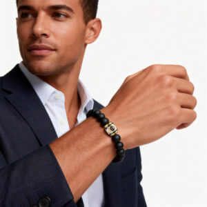 Men-wearing-black-onyx-bracelet-with-three-eyed-core-beads-1
