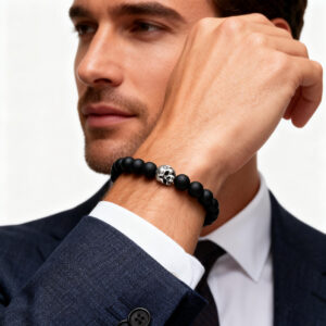 Men wearing black onyx skull bracelet with silver charm