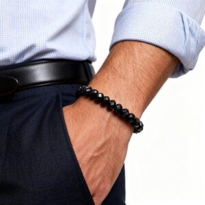 Men’s black spinel bracelet worn on wrist