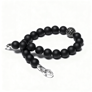 Close-up of diamond accent on men’s black onyx bead bracelet
