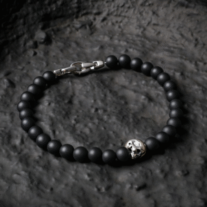 925 sterling silver skull on black onyx bead bracelet Place it on the black stone