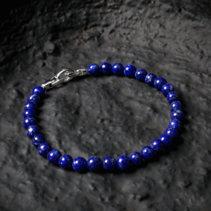 Men’s lapis lazuli bracelet laid flat, 6mm round beads with polished finish