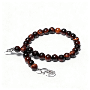 Side view of men’s red tiger eye bracelet showing natural bead texture and polished finish