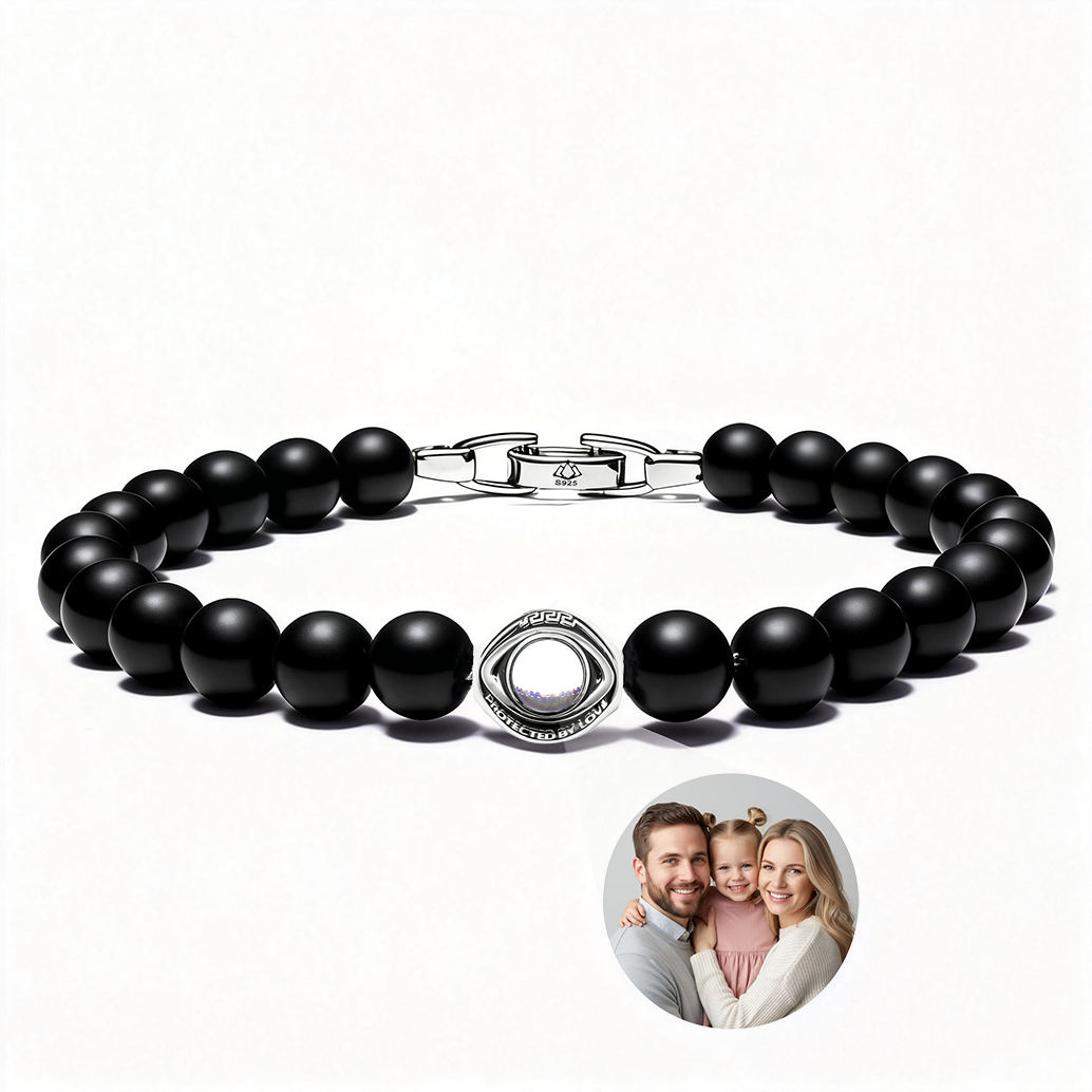 Men’s black onyx evil eye projection bracelet with silver clasp, handmade minimalist design