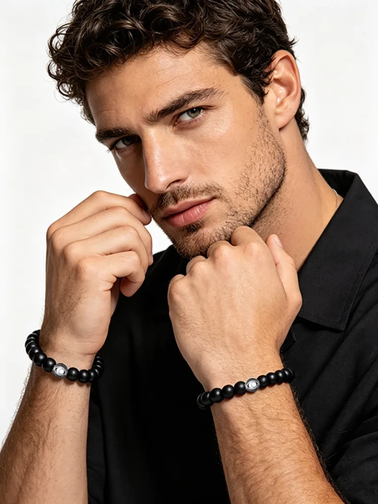 Comparison showing the meaning of wearing an evil eye bracelet on the left wrist versus the right wrist for men.